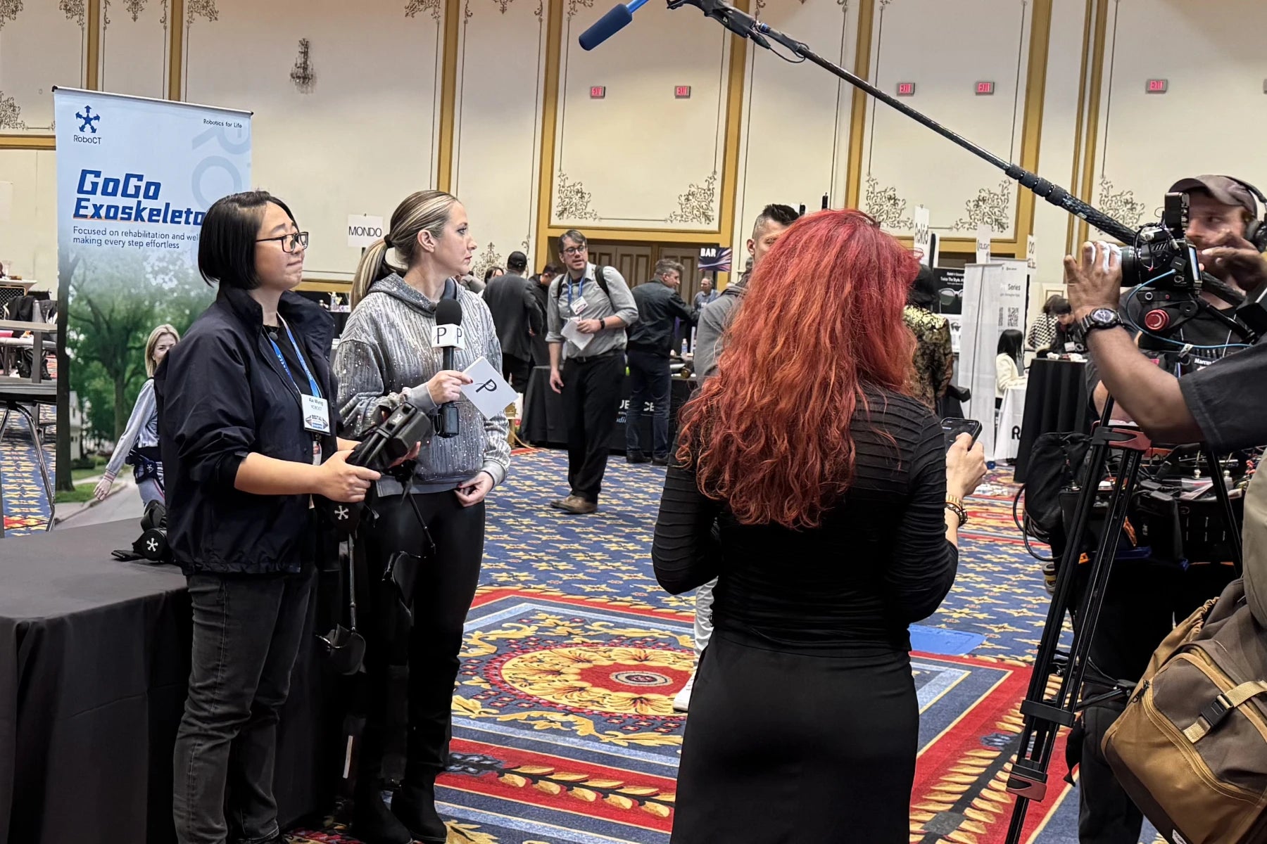 Media is reporting about GoGo H exoskeleton at RoboCT booth on CES 2026
